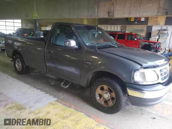 2002 Ford F-150 XL with VIN 1FTRF17W72NA55539, listed as a Copart auction lot 82529424 with 181,747 mi miles and Salvage Title. Bid and sale history available at carsss.com. Image 4.
