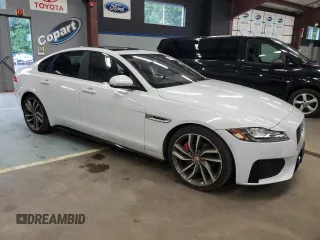2016 Jaguar XF S with VIN SAJBG4BV0GCY00411, listed as a Copart auction lot 66068964 with 94,983 mi miles and Salvage Title. Bid and sale history available at carsss.com. Image 4.