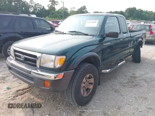1999 Toyota Tacoma PreRunner z VIN 4TASM92N7XZ505612, wystawiony jako IAAI lot #42413856 z przebiegiem 131 140 mil mil oraz . Historia ofert i sprzedaży dostępna na DreamBid. Obrazek 2.