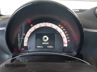 2017 Smart fortwo Pure z VIN WMEFJ9BA8HK231165, wystawiony jako IAAI lot #42238753 z przebiegiem 31 242 mil mil oraz . Historia ofert i sprzedaży dostępna na DreamBid. Obrazek 7.