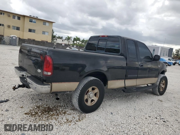 2000 Ford F-150 XL with VIN 1FTZX1721YNC09536, listed as a Copart auction lot 52645405 with 120,638 mi miles and Salvage Title. Bid and sale history available at carsss.com. Image 3.