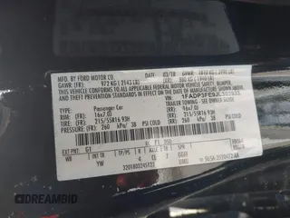 2018 Ford Focus SE z VIN 1FADP3FE9JL303933, wystawiony jako IAAI lot #42530171 z przebiegiem Nie podano mil oraz . Historia ofert i sprzedaży dostępna na DreamBid. Obrazek 9.