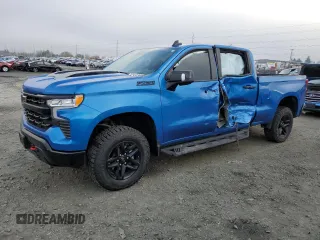 2024 Chevrolet Silverado 1500 LT Trail Boss with VIN 3GCUDFE8XRG210895, listed as a Copart auction lot 82555804 with 8,909 mi miles and Salvage Title. Bid and sale history available at DreamBid. Image 1.