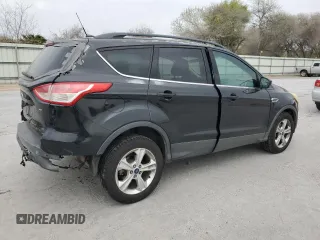 2014 Ford Escape SE with VIN 1FMCU0GX8EUB08186, listed as a Copart auction lot 48189035 with 128,483 mi miles and Salvage Title. Bid and sale history available at carsss.com. Image 3.