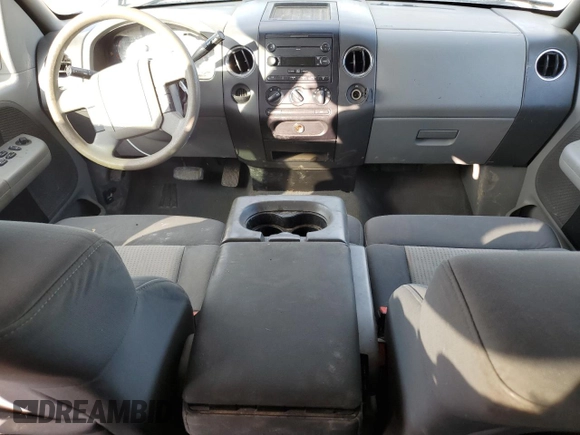 2007 Ford F-150 STX with VIN 1FTRX12W17FA68454, listed as a Copart auction lot 50409485 with 256,600 mi miles and Salvage Title. Bid and sale history available at DreamBid. Image 8.