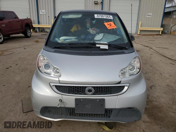 2015 Smart fortwo Passion с VIN WMEEJ9AA1FK831357, выставлен на аукционе Copart как лот 87001564 с пробегом Не указан миль и Списание • Salvage title. История ставок и продаж доступна на DreamBid. Изображение 5.