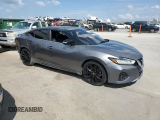 2020 Nissan Maxima SR with VIN 1N4AA6EV2LC379097, listed as a Copart auction lot 58047325 with 76,387 mi miles and Salvage title. Bid and sale history available at DreamBid. Image 4.