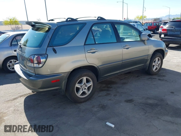 2001 Lexus RX 300 with VIN JTJGF10U710086704, listed as a IAAI auction lot 42183875 with 221,612 mi miles and . Bid and sale history available at DreamBid. Image 4.