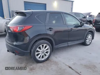 2014 Mazda CX-5 Grand Touring with VIN JM3KE4DY5E0386043, listed as a Copart auction lot 48866995 with 183,626 mi miles and Salvage Title. Bid and sale history available at DreamBid. Image 3.