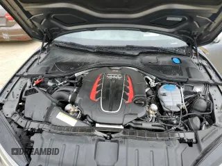 2016 Audi RS 7 Prestige z VIN WUAW2AFC2GN900328, wystawiony jako Copart lot #74450074 z przebiegiem Nie podano mil oraz Nie do naprawy. Historia ofert i sprzedaży dostępna na DreamBid. Obrazek 11.
