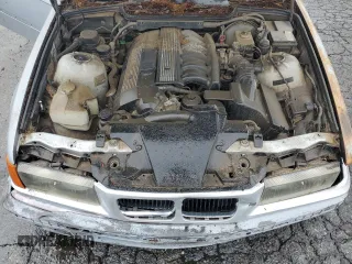 1998 BMW 3 Series 328is with VIN WBABG132XWET07045, listed as a Copart auction lot 49470225 with 186,922 mi miles and Clean Title. Bid and sale history available at carsss.com. Image 11.