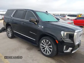 2021 GMC Yukon Denali with VIN 1GKS2DKL3MR308321, listed as a IAAI auction lot 41771365 with 63,415 mi miles. Bid and sale history available at carsss.com. Image 1.