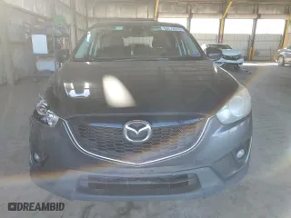 2014 Mazda CX-5 Touring with VIN JM3KE4CY1E0394643, listed as a Copart auction lot 50274515 with 147,294 mi miles and Salvage Title. Bid and sale history available at carsss.com. Image 5.