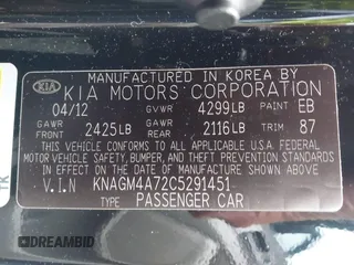 2012 Kia Optima LX with VIN KNAGM4A72C5291451, listed as a IAAI auction lot 42068559 with 121,548 mi miles and . Bid and sale history available at carsss.com. Image 9.