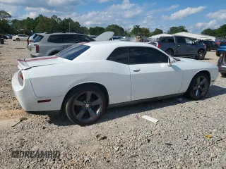2013 Dodge Challenger SXT z VIN 2C3CDYAG0DH595482, wystawiony jako Copart lot #52610005 z przebiegiem 97 470 mil mil oraz Szkoda całkowita • Salvage title. Historia ofert i sprzedaży dostępna na DreamBid. Obrazek 3.