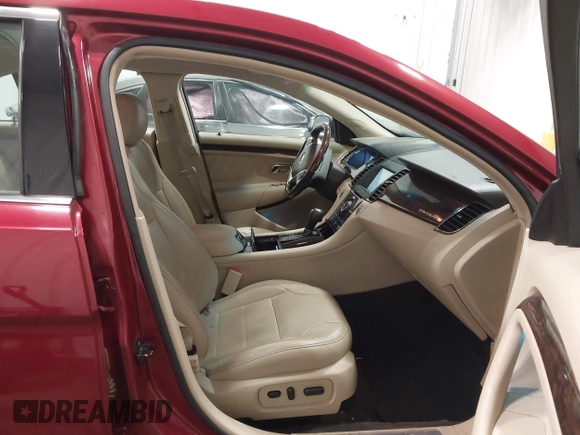 2013 Ford Taurus Limited with VIN 1FAHP2F82DG140741, listed as a IAAI auction lot 41882262 with 131,017 mi miles. Bid and sale history available at carsss.com. Image 5.