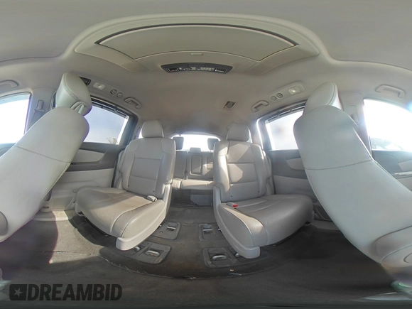 2014 Honda Odyssey Touring with VIN 5FNRL5H93EB034263, listed as a Copart auction lot 57254485 with 150,084 mi miles and Salvage title. Bid and sale history available at DreamBid. Image 15.