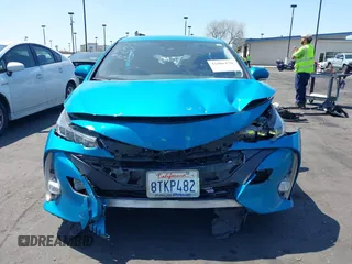 2021 Toyota Prius LE with VIN JTDKAMFP7M3169633, listed as a IAAI auction lot 41986170 with 55,925 mi miles and . Bid and sale history available at DreamBid. Image 13.