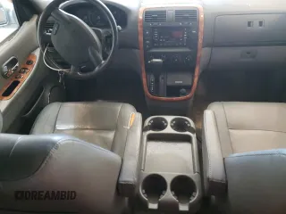 2004 Kia Sedona LX with VIN KNDUP131946569536, listed as a Copart auction lot 82963493 with 119,901 mi miles and Clean Title. Bid and sale history available at carsss.com. Image 8.