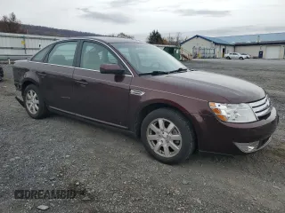 2009 Ford Taurus SE with VIN 1FAHP23W89G125025, listed as a Copart auction lot 80710004 with 114,176 mi miles and Salvage Title. Bid and sale history available at carsss.com. Image 4.
