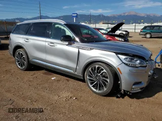 2020 Lincoln Aviator Reserve z VIN 5LM5J7XC2LGL35647, wystawiony jako Copart lot #71263444 z przebiegiem 56 792 mil mil oraz Szkoda całkowita • Salvage title. Historia ofert i sprzedaży dostępna na DreamBid. Obrazek 4.
