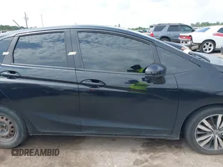 2015 Honda Fit EX-L z VIN 3HGGK5H81FM723962, wystawiony jako IAAI lot #42455367 z przebiegiem 104 859 mil mil oraz . Historia ofert i sprzedaży dostępna na DreamBid. Obrazek 13.