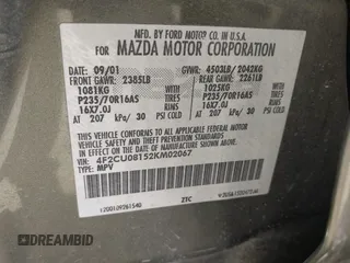 2002 Mazda Tribute LX with VIN 4F2CU08152KM02067, listed as a IAAI auction lot 42198970 with 212,613 mi miles and . Bid and sale history available at carsss.com. Image 9.