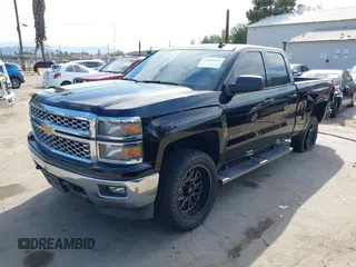 2014 Chevrolet Silverado 1500 LT with VIN 1GCVKREC7EZ417660, listed as a IAAI auction lot 41993599 with 137,025 mi miles and . Bid and sale history available at DreamBid. Image 2.