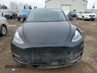 2022 Tesla Model Y Performance z VIN 7SAYGDEF5NF512464, wystawiony jako Copart lot #46337165 z przebiegiem 74 761 mil mil oraz Szkoda całkowita • Salvage title. Historia ofert i sprzedaży dostępna na DreamBid. Obrazek 5.