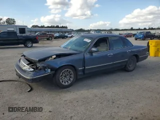 1997 Ford Crown Victoria z VIN 2FALP73WXVX130545, wystawiony jako Copart lot #78477614 z przebiegiem 164 385 mil mil oraz Szkoda całkowita • Salvage title. Historia ofert i sprzedaży dostępna na DreamBid. Obrazek 1.