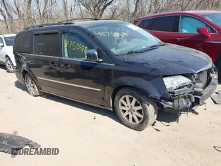 2010 Chrysler Town & Country Touring with VIN 2A4RR5DX4AR142080, listed as a IAAI auction lot 41752678 with 197,000 mi miles. Bid and sale history available at carsss.com. Image 1.