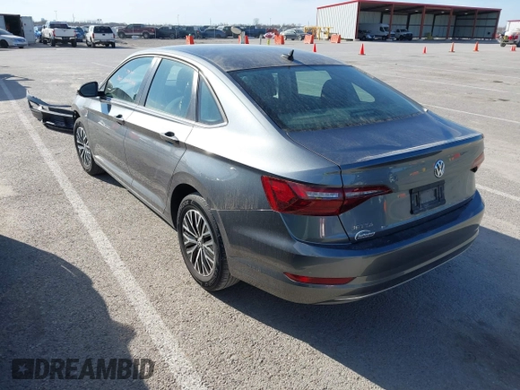 2021 Volkswagen Jetta S z VIN 3VWC57BU8MM098931, wystawiony jako IAAI lot #41818622 z przebiegiem 10 469 mil mil oraz . Historia ofert i sprzedaży dostępna na DreamBid. Obrazek 3.