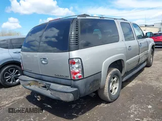 2004 Chevrolet Suburban Z71 z VIN 3GNFK16Z94G210623, wystawiony jako IAAI lot #42227673 z przebiegiem 183 831 mil mil oraz . Historia ofert i sprzedaży dostępna na DreamBid. Obrazek 4.