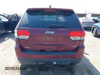 2017 Jeep Grand Cherokee Laredo with VIN 1C4RJEAG4HC674921, listed as a IAAI auction lot 41876971 with 115,773 mi miles. Bid and sale history available at carsss.com. Image 17.