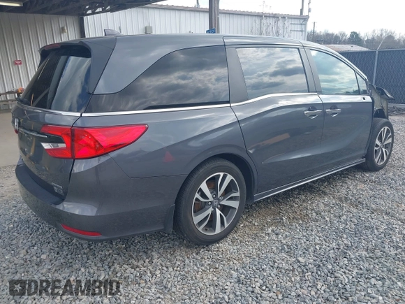 2023 Honda Odyssey Touring with VIN 5FNRL6H86PB065670, listed as a IAAI auction lot 41691093 with 22,518 mi miles and . Bid and sale history available at DreamBid. Image 4.