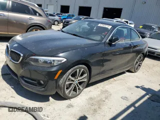 2015 BMW 2 Series 228i with VIN WBA1F5C57FV256989, listed as a Copart auction lot 62583215 with 110,112 mi miles and Salvage title. Bid and sale history available at DreamBid. Image 1.