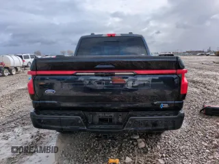 2023 Ford F-150 Lightning Pro с VIN 1FTVW1EV5PWG16444, выставлен на аукционе Copart как лот 48224415 с пробегом 25 782 миль миль и Списание • Salvage title. История ставок и продаж доступна на DreamBid. Изображение 6.