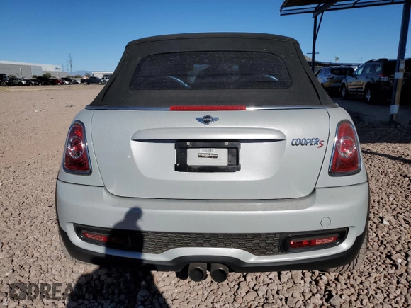 2012 MINI Convertible S z VIN WMWZP3C53CT296188, wystawiony jako Copart lot #88159445 z przebiegiem 110 859 mil mil oraz Szkoda całkowita • Salvage title. Historia ofert i sprzedaży dostępna na DreamBid. Obrazek 6.