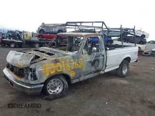 1996 Ford F-150 with VIN 1FTEF14H9TNA12410, listed as a IAAI auction lot 40016268 with 1 mi miles. Bid and sale history available at carsss.com. Image 2.