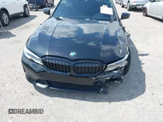 2021 BMW 3 Series 330i with VIN 3MW5R1J09M8B93600, listed as a IAAI auction lot 41735270 with 77,648 mi miles. Bid and sale history available at carsss.com. Image 6.