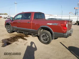 2016 Nissan Titan XD PRO-4X with VIN 1N6BA1F43GN512559, listed as a Copart auction lot 76691104 with 0 mi miles and Salvage Title. Bid and sale history available at carsss.com. Image 2.
