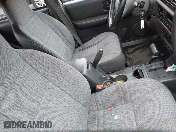 2000 Jeep Cherokee z VIN 1J4FF48S1YL131481, wystawiony jako IAAI lot #41947074 z przebiegiem Nie podano mil oraz . Historia ofert i sprzedaży dostępna na DreamBid. Obrazek 5.