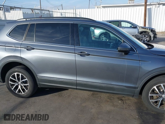 2021 Volkswagen Tiguan SE with VIN 3VV3B7AX8MM071303, listed as a IAAI auction lot 41109686 with 40,684 mi miles and . Bid and sale history available at DreamBid. Image 13.