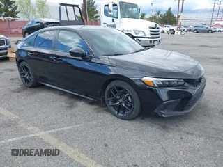 2023 Honda Civic Sport with VIN 19XFL2H82PE021151, listed as a IAAI auction lot 41943345 with 55,679 mi miles and . Bid and sale history available at DreamBid. Image 1.