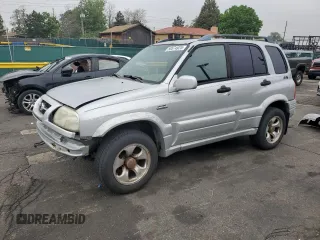 1999 Suzuki Grand Vitara JLX z VIN JS3TD62V9X4123460, wystawiony jako Copart lot #58574925 z przebiegiem 260 368 mil mil oraz Szkoda całkowita • Salvage title. Historia ofert i sprzedaży dostępna na DreamBid. Obrazek 1.