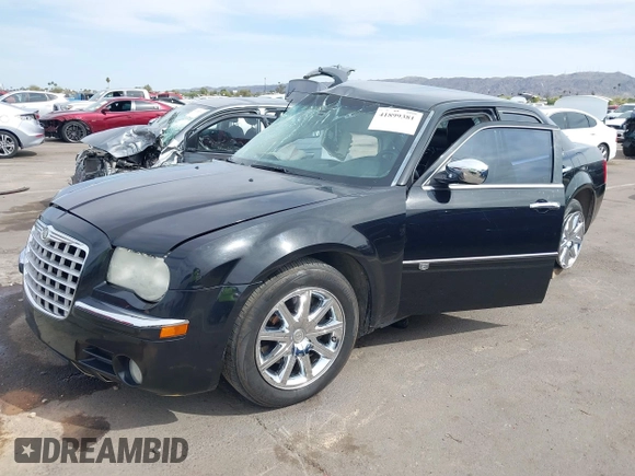 2008 Chrysler 300 C Hemi with VIN 2C3KA63H18H335466, listed as a IAAI auction lot 41899381 with Not Provided miles and . Bid and sale history available at carsss.com. Image 2.
