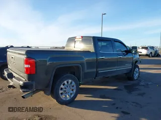 2017 GMC Sierra 2500HD Denali z VIN 1GT12UEG3HF132898, wystawiony jako IAAI lot #41442407 z przebiegiem 83 432 mil mil oraz . Historia ofert i sprzedaży dostępna na DreamBid. Obrazek 4.