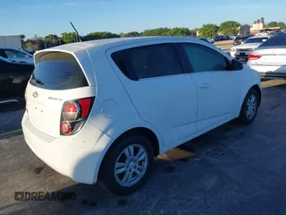 2014 Chevrolet Sonic LT with VIN 1G1JC6SH8E4231285, listed as a IAAI auction lot 41680059 with 167,666 mi miles. Bid and sale history available at carsss.com. Image 4.