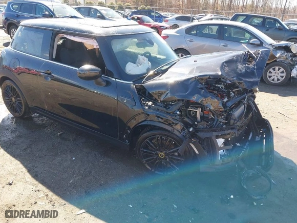2024 MINI Hardtop 2 Door Cooper SE with VIN WMW13DJ03R2V25523, listed as a IAAI auction lot 41585964 with 7,690 mi miles. Bid and sale history available at carsss.com. Image 1.