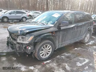 2016 Dodge Journey SXT with VIN 3C4PDDBG3GT200663, listed as a IAAI auction lot 41300576 with 160,140 mi miles. Bid and sale history available at carsss.com. Image 17.